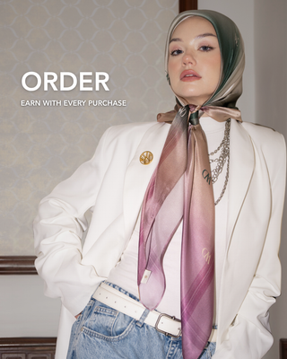 Woman wearing a scarf with text overlay 'ORDER EARN WITH EVERY PURCHASE' on a neutral background